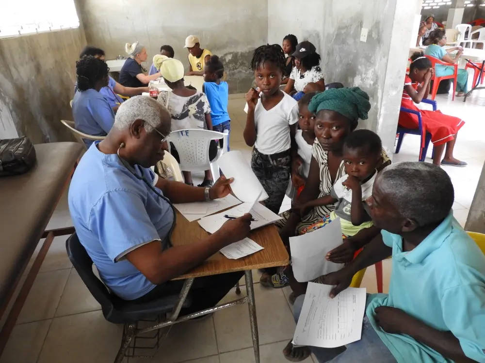 Doctor consulting with a family